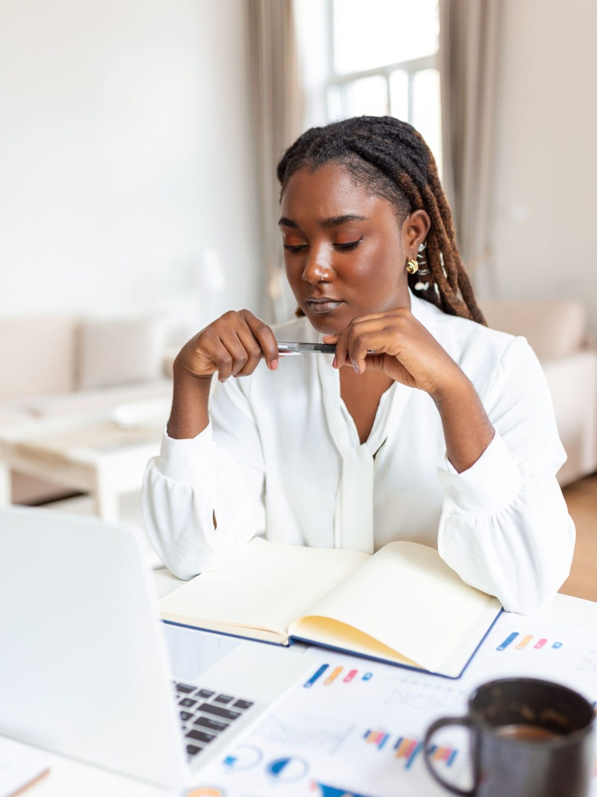serious-frowning-african-american-ethnicity-woman-sit-workplace-desk-looks-laptop-screen-read-email-feels-concerned-bored-unmotivated-tired-employee-problems-difficulties-with-app (1)